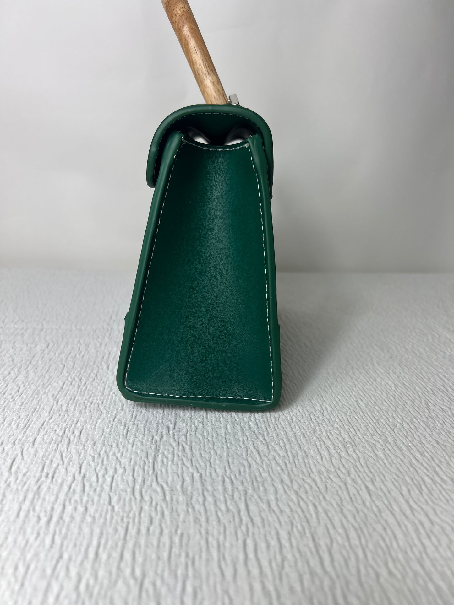 Green handbag with matching wallet
