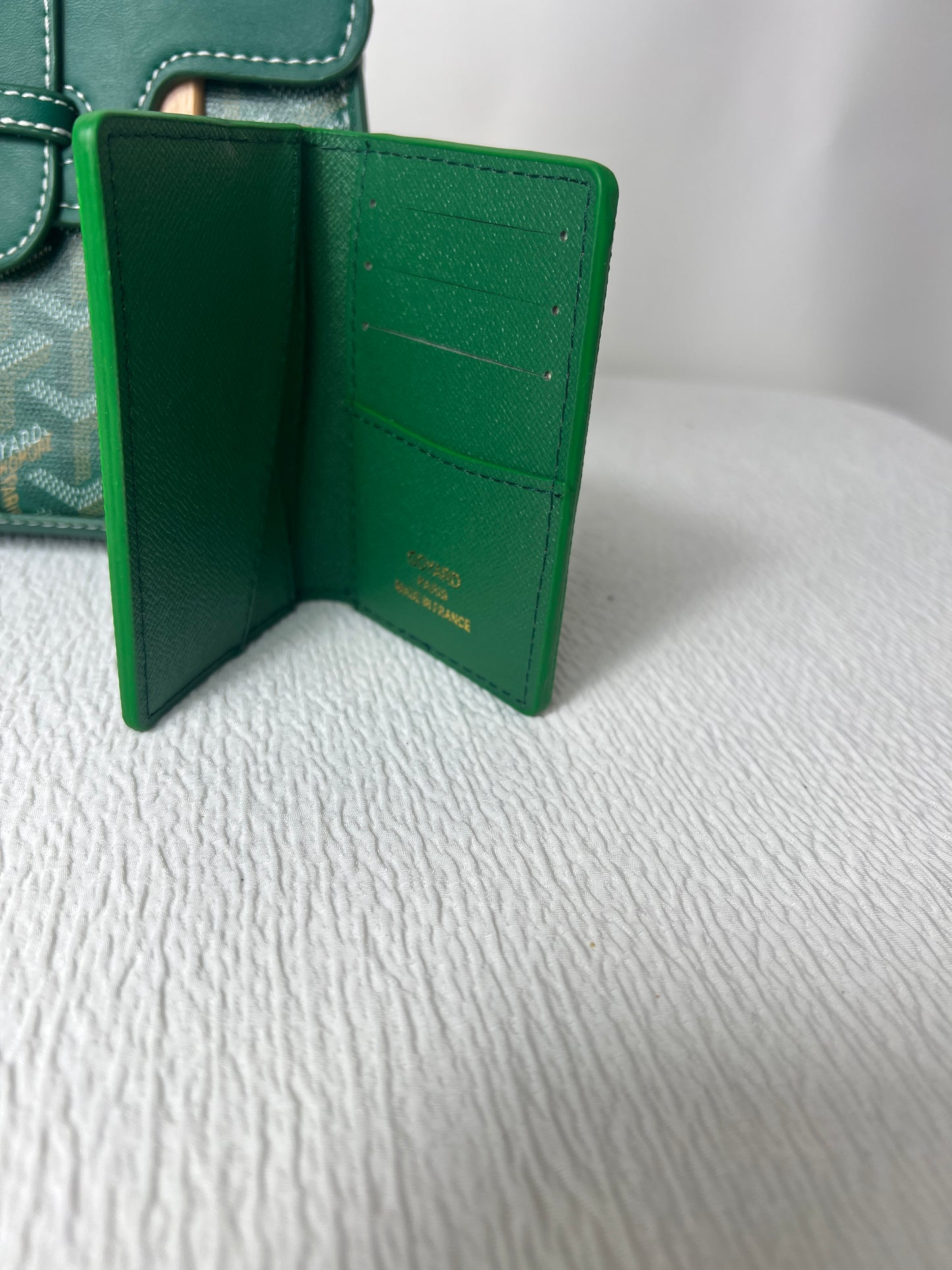 Green handbag with matching wallet
