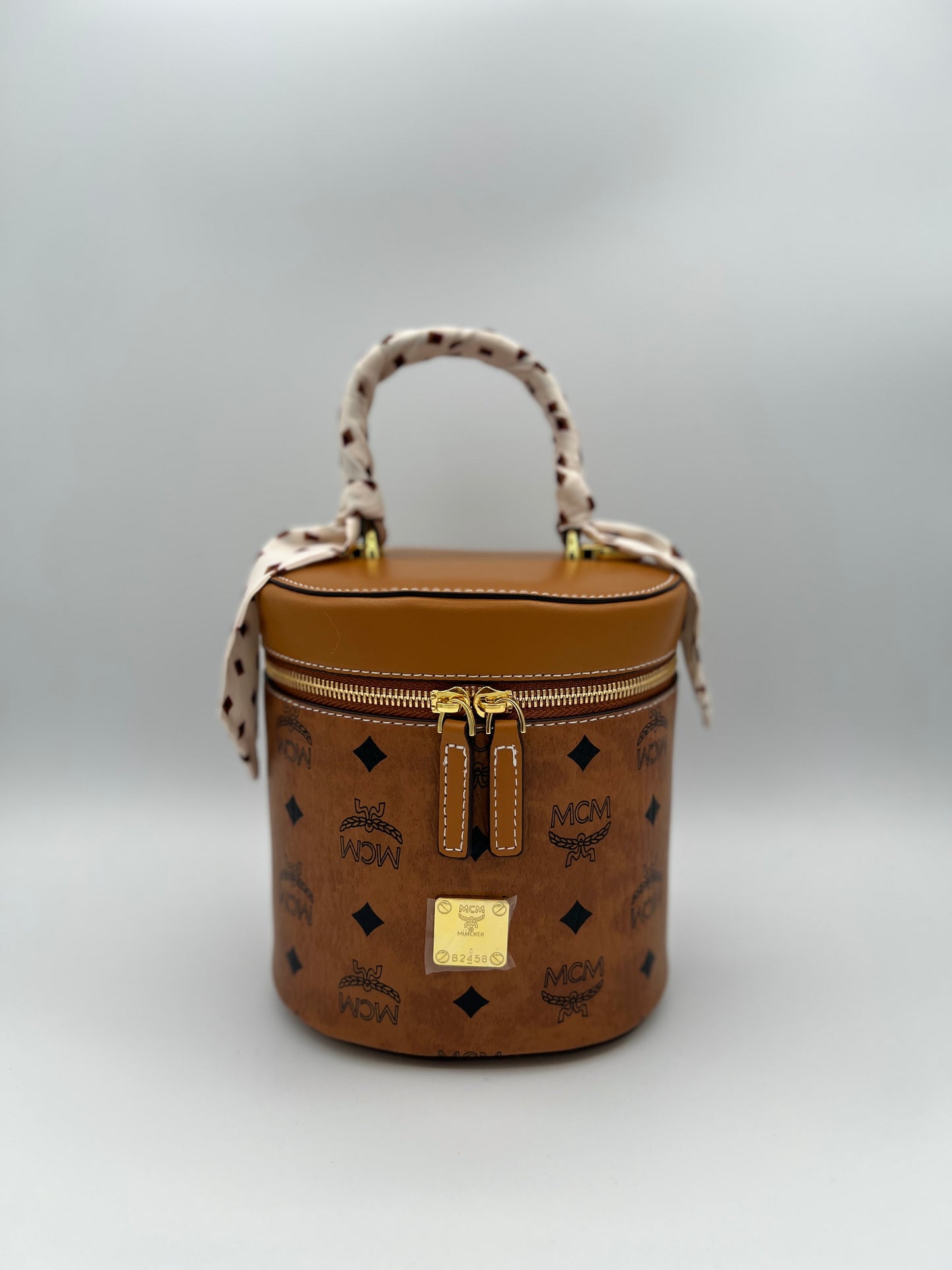 M cylinder crossbody