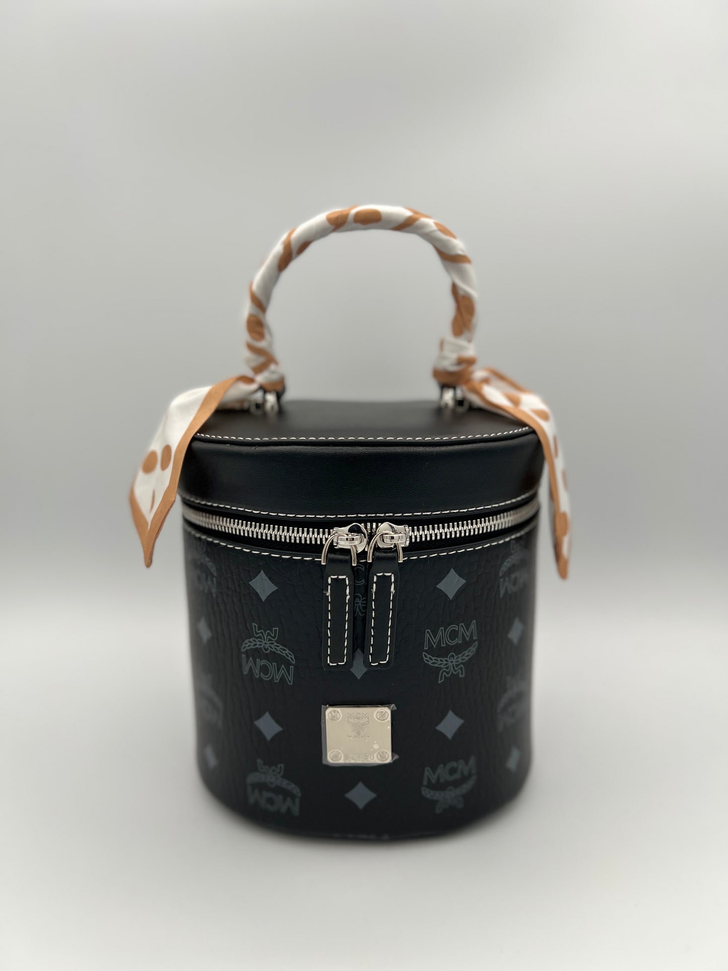 M cylinder crossbody