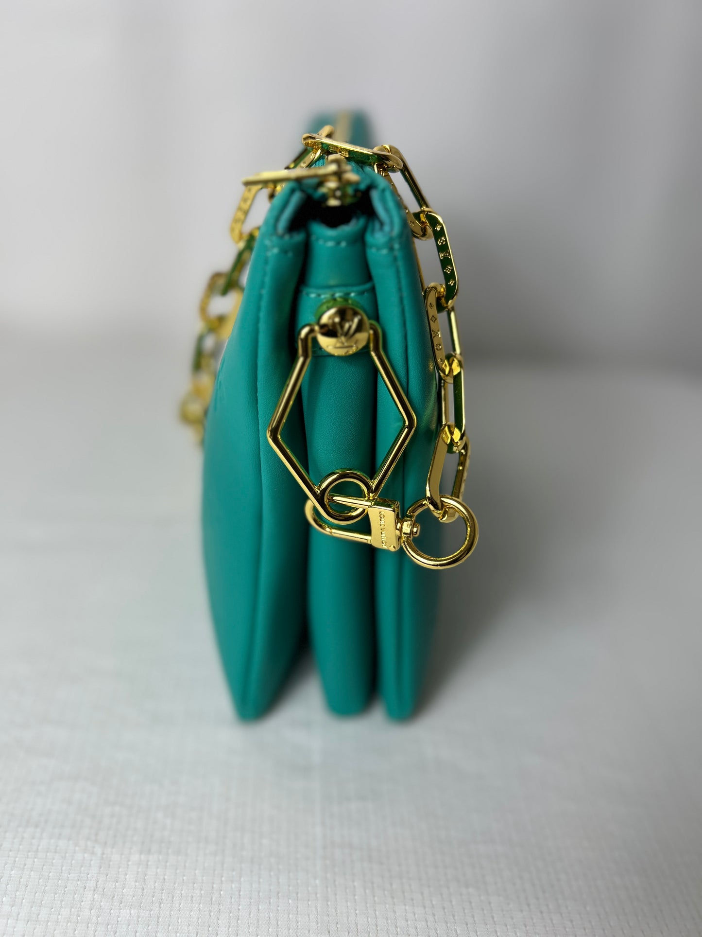 Turquoise embossed with chain ￼