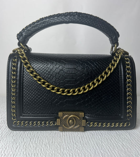 CC with snake skin imprint.